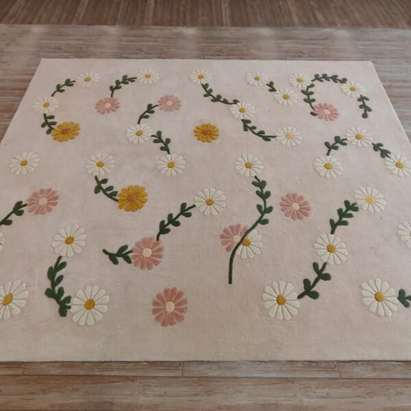 Daisy Floral Rug featuring white and pink daisy flowers on a blush pink background.