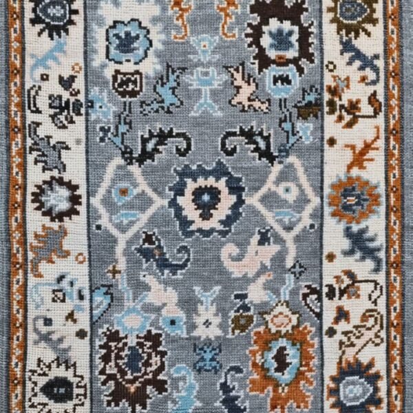 Traditional Hand Knotted Wool Rug with vintage Persian floral pattern.